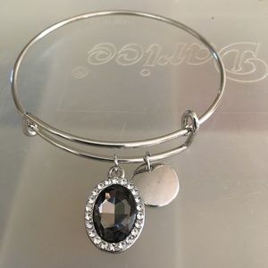 Silver bracelet with two charms